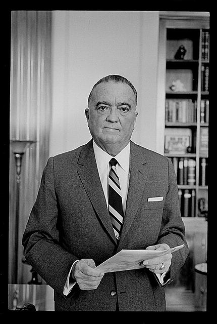 From the LOC: "Photograph shows FBI director J. Edgar Hoover, half-length portrait, facing front."