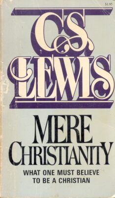 An aged, paperback cover of C.S. Lewis' *Mere Christianity*. The author's name is in large white script at the top of the cover, with the title in dark blue text at the bottom. The background color is a light blue. 